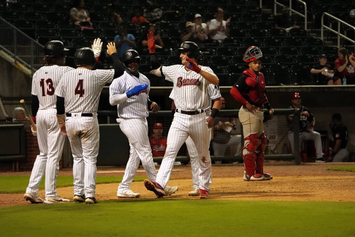 Colson Montgomery celebrates after his grand slam