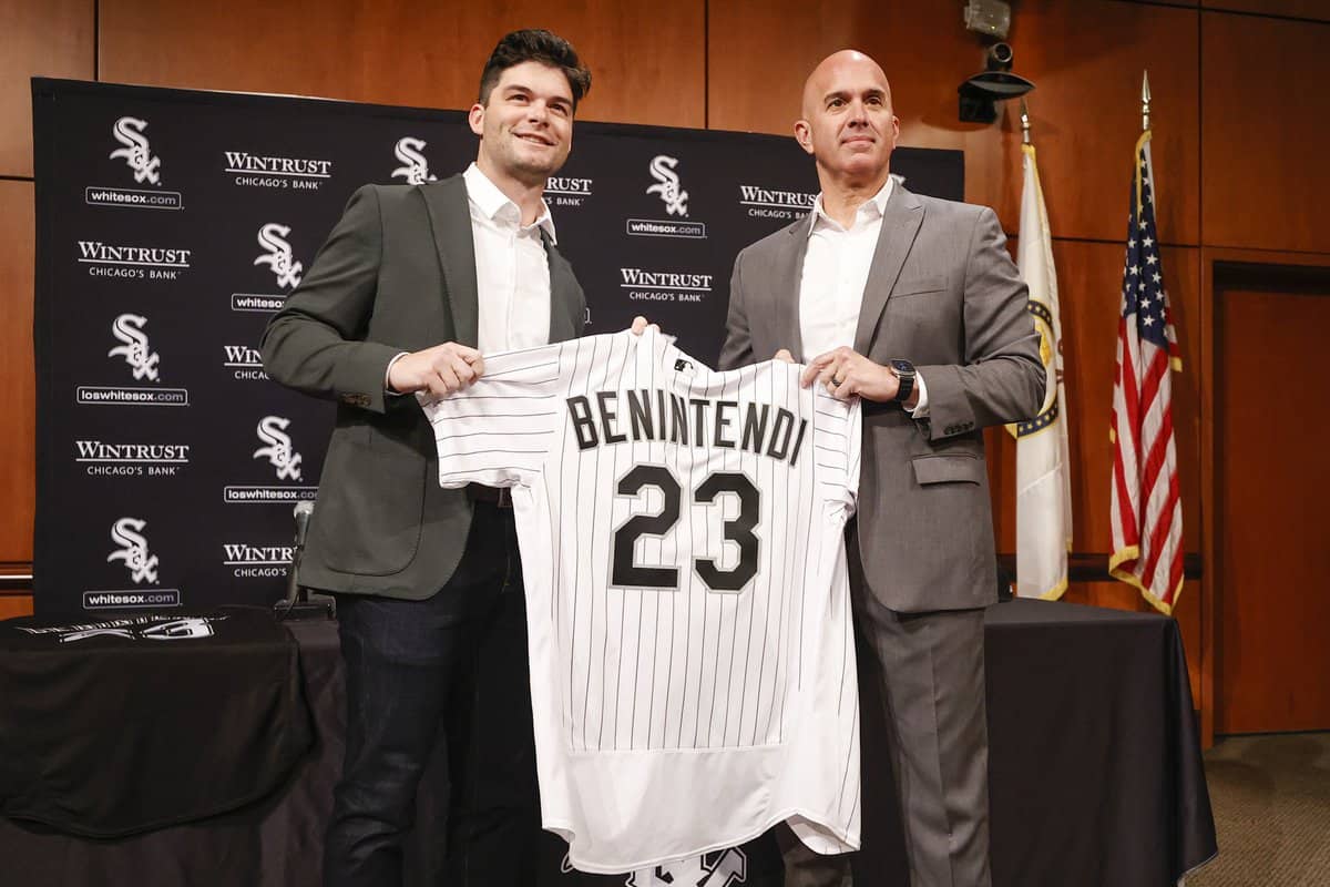 Jan 4, 2023; Chicago, Illinois, USA; Chicago White Sox manager Pedro Grifol (right) poses with free-agent outfielder Andrew Benintendi (left) during a press conference at Guaranteed Rate Field. Mandatory Credit: Kamil Krzaczynski-USA TODAY Sports