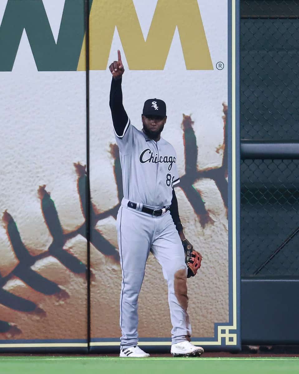 White Sox center fielder Luis Robert celebrates