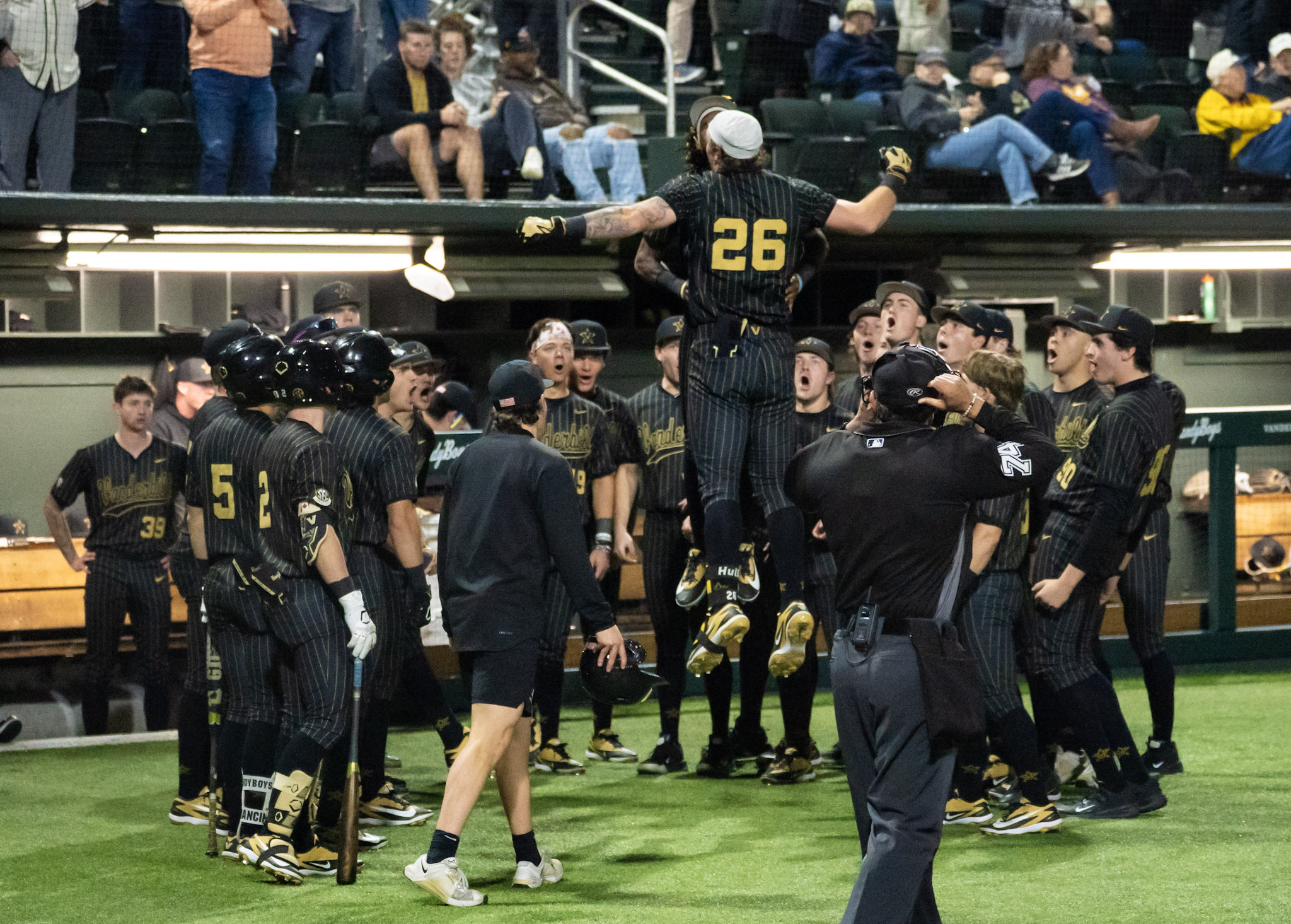 Vanderbilt outfielder Braden Holcomb (#26) leaps in celebration after hitting a home run against LSU (Photo by Jim Margalus, Sox Machine)