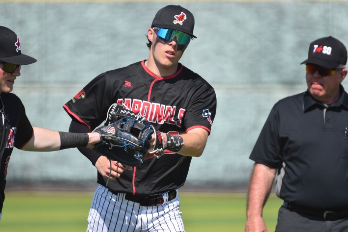 Grady Emerson slaps gloves with a teammate (Photo by Josh Nelson, Sox Machine)