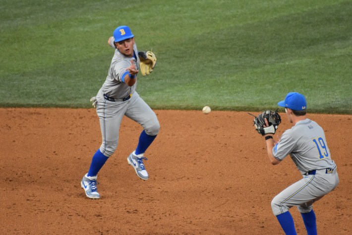 UCLA shortstop Roch Cholowsky makes a toss to second base (Photo by Josh Nelson, Sox Machine)