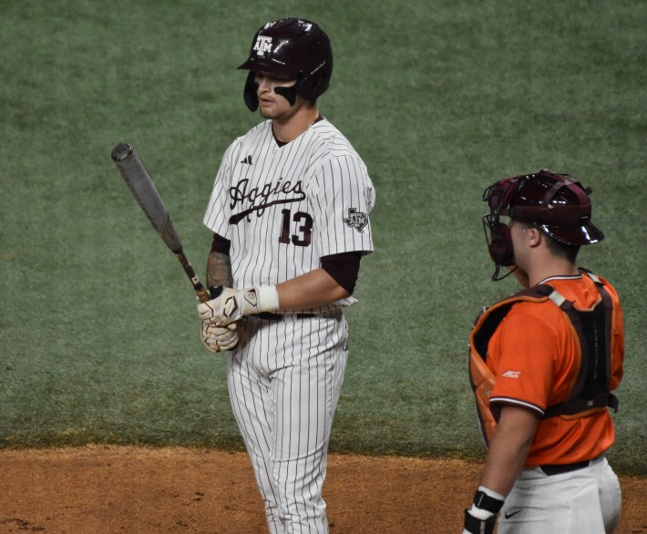 Texas A&M outfielder Caden Sorrell checks his bat during game against Virginia Tech (Photo by Josh Nelson, Sox Machine)