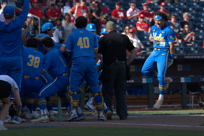 UCLA first baseman Mulivai Levu skips towards home plate after hitting a walk-off three-run homer against USC in the 2026 Big Ten Tournament (Photo by Josh Nelson, Sox Machine)