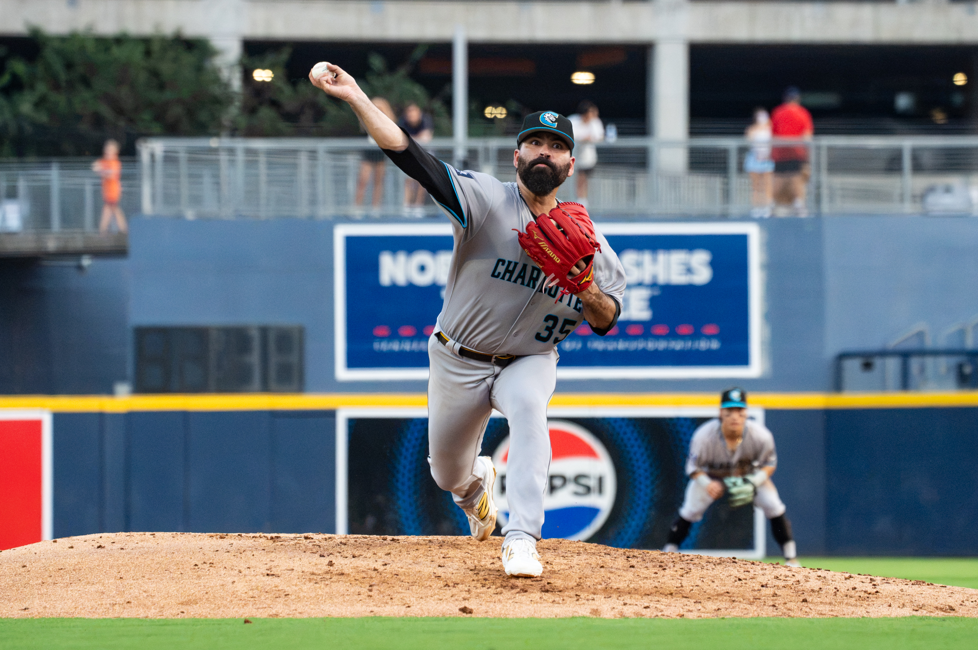 José Urquidy pitching for the Charlotte Knights