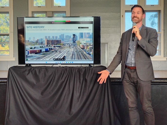 Amtrak senior director of real estate Steven Segerlin presents during a community meeting with Bridgeport residents on August 26, 2026 (Photo by Josh Nelson, Sox Machine)