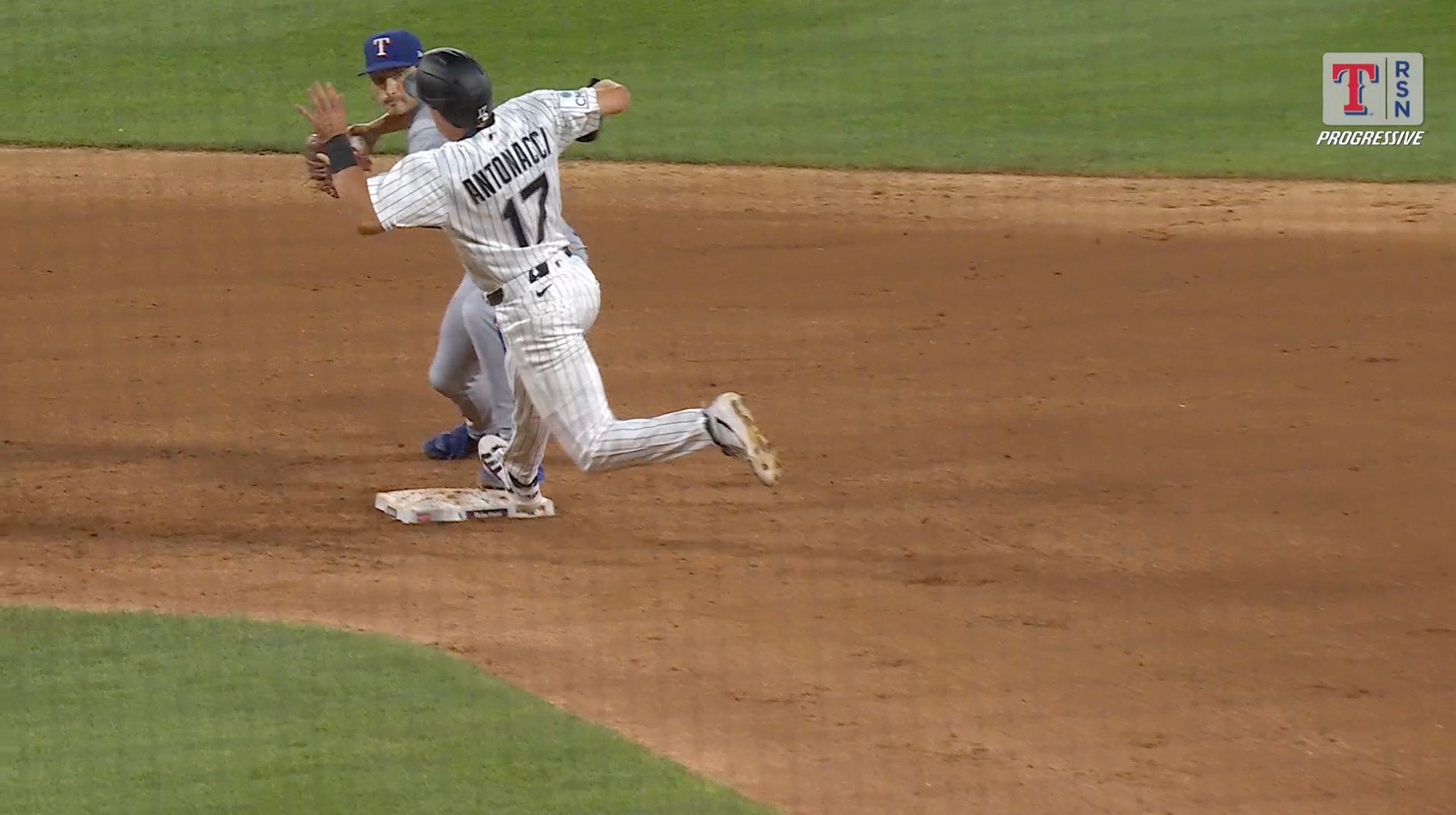 Sam Antonacci rounding second on double plays