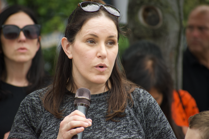 Bridgeport resident Alicia Ferro addresses the crowd during a rally on Saturday, August 30, 2026 (Photo by Josh Nelson, Sox Machine)